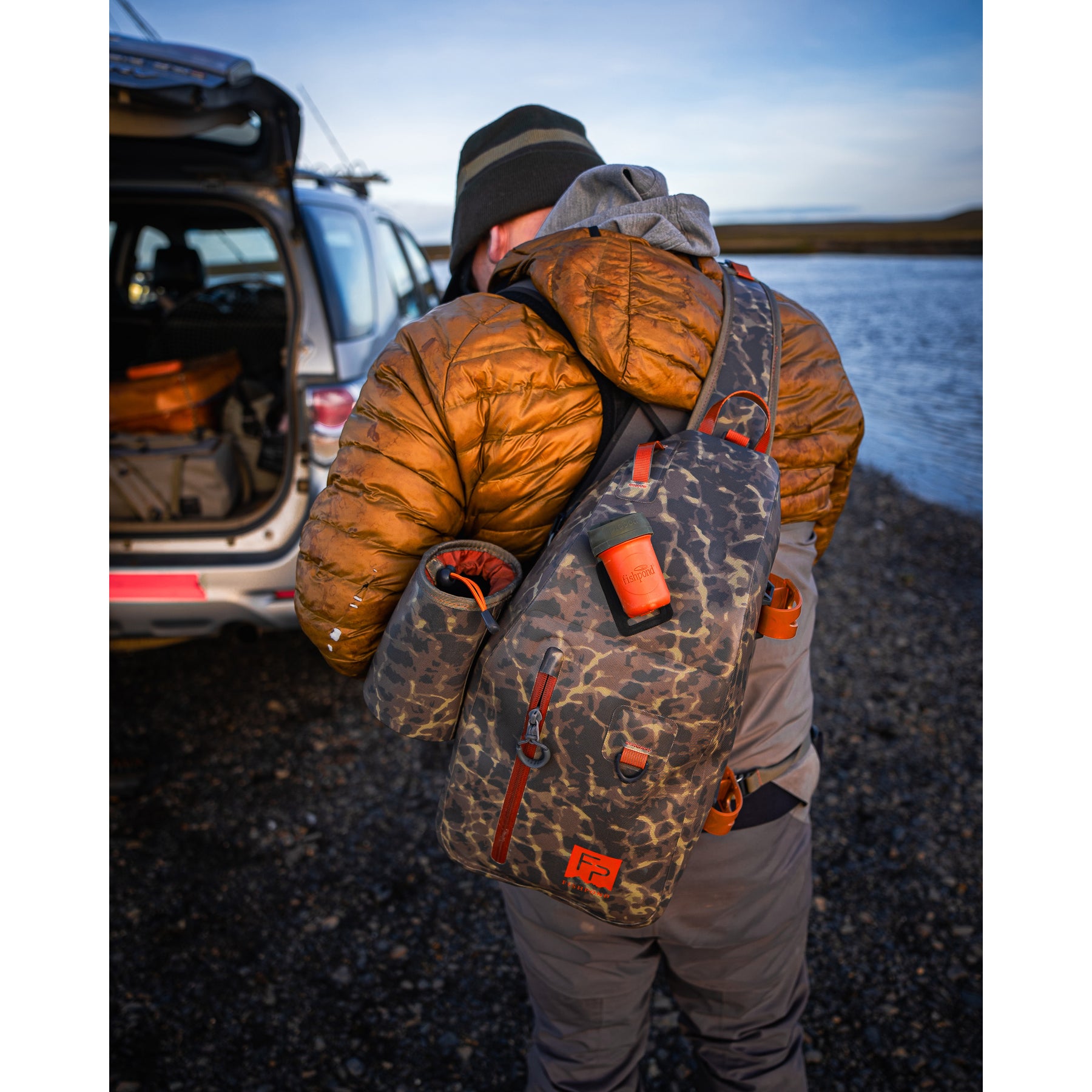 attaching fishing net to thunderhead sling Fishpond Thunderhead Water Bottle Holder – Bear's Den Fly Fishing Co